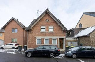 Einfamilienhaus kaufen in 41569 Rommerskirchen, Sanierungsbedürftiges Einfamilienhaus mit Anbau & Garten - Potenzial zur individuellen Gestaltung!