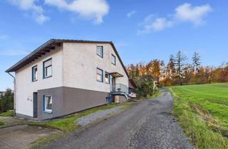 Haus kaufen in 36280 Oberaula, Zweifamilienhaus mit vermieteter Einliegerwohnung in ruhiger Lage