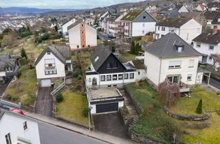 Einfamilienhaus kaufen in 56218 Mülheim-Kärlich, Gepflegtes Einfamilienhaus mit Kamin, Doppelgarage und großzügigem Grundstück