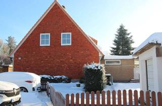 Doppelhaushälfte kaufen in 21255 Tostedt, Charmante Doppelhaushälfte mit Garage und Carport – perfekt für Ihre Familie