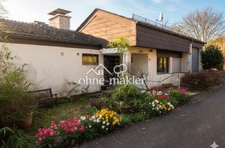 Einfamilienhaus kaufen in 97846 Partenstein, Wohnen im Wald-Panorama: Lichtdurchflutetes Architekten-Juwel in Partenstein