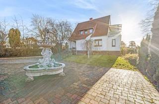 Einfamilienhaus kaufen in 31311 Uetze, Liebevoll modernisiertes Einfamilienhaus mit Baulücke und hochwertiger Großgarage!