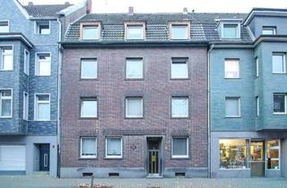 Mehrfamilienhaus kaufen in 41460 Neuss, Neuss - Solides Mehrfamilienhaus mit attraktivem Entwicklungspotenzial