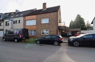 Einfamilienhaus kaufen in 41515 Grevenbroich, Grevenbroich - Einfamilienhaus mit großem Grundstück und zusätzlichem sanierungsbedürftigen Wohngebäude