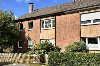 Wohnung kaufen in 46483 Wesel, Gemütliche Erdgeschosswohnung mit eigenem Garten und Garage im gepflegten Zweifamilienhaus