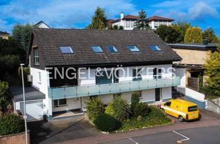 Wohnung kaufen in 65510 Hünstetten, Charmante 5-Zimmer-Wohnung mit weitläufigem Garten