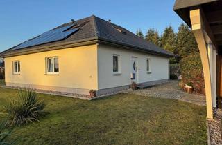 Haus kaufen in 19417 Warin, Großzügiger Bungalow mit zusätzlicher Wohnfläche im Dachgeschoss
