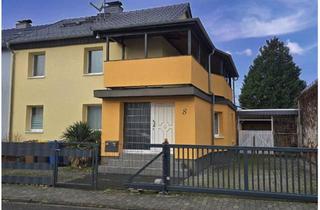 Doppelhaushälfte kaufen in 65479 Raunheim, Familienfreundliche Doppelhaushälfte mit Garten, ruhig & zentral gelegen