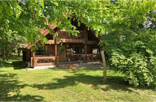 Haus kaufen in 03116 Drebkau, Wohnen am Wasser – Finnische Blockhäuser in idyllischer Parkanlage
