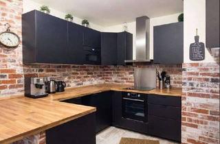 Wohnung kaufen in 47829 Uerdingen, Individuelle Dachgeschosswohnung mit Balkon und TG-Stellplatz