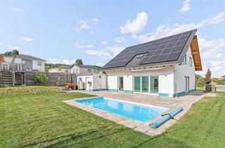 Einfamilienhaus kaufen in 35435 Wettenberg, Neuwertiges Einfamilienhaus mit beheiztem Außenpool in Wettenberg!