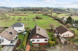 Einfamilienhaus kaufen in 63654 Büdingen, Attraktives Einfamilienhaus in ruhiger Feldrandlage mit großem Potenzial