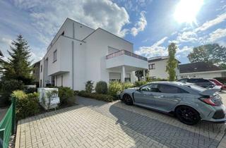 Wohnung kaufen in 53359 Rheinbach, Zwei - Moderne Souterrainwohnungen mit Terrasse - ein Preis