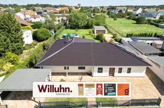 Haus kaufen in 04509 Löbnitz, Einzigartiges Mehrgenerationenwohnen im Bungalowstil | Wunderschönes Grundstück | Pool | Erdwärme