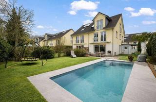 Doppelhaushälfte kaufen in 61118 Bad Vilbel, Doppelhaushälfte mit hochwertiger Ausstattung und beheiztem Außenpool