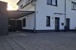 Reihenhaus kaufen in 33378 Rheda-Wiedenbrück, Charmantes Reihenhaus mit 3 Zimmern und Carport in Rheda-Wiedenbrück