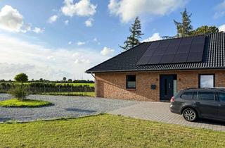 Haus kaufen in 25885 Oster-Ohrstedt, Moderner Bungalow mit PV-Anlage, Ausbaureserve und Feldblick