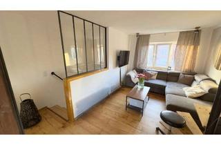 Wohnung kaufen in 24147 Elmschenhagen-Nord, Flair pur! Wohlfühl-Eigentumswohnung mit Garten im Stil eines Endreihenhauses