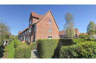 Wohnung kaufen in 24147 Elmschenhagen-Nord, Flair pur! Moderne Eigentumswohnung mit eigenem Garten im Stil eines Endreihenhauses