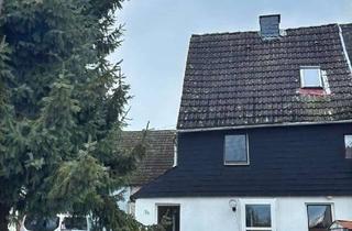 Doppelhaushälfte kaufen in 56244 Hahn, Doppelhaushälfte mit Grundstück voller Potential!