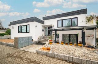 Einfamilienhaus kaufen in 76744 Wörth, Architekten-Bungalow mit Atriumgarten, Wellnessbereich & hochwertiger Massivbauweise