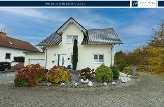 Einfamilienhaus kaufen in 55278 Hahnheim, Naturnahes Familienhaus mit ELW, gepflegtem Garten mit Teichanlage und Doppelgarage für Ihr Familienglück!