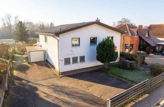 Einfamilienhaus kaufen in 35274 Kirchhain, Top Lage: Attraktives Einfamilienhaus mit Gewerbeanteil im Erdgeschoss