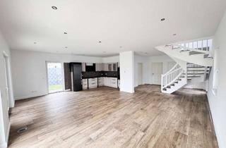 Einfamilienhaus kaufen in 41363 Jüchen, Zukunftssicher wohnen – Einfamilienhaus mit großem Garten, Energieeffizienz A