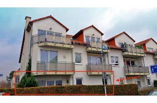 Wohnung kaufen in 65439 Flörsheim, Flörsheim am Main - Charmante 2-Zimmer-Erdgeschosswohnung mit Garten & Stellplätzen