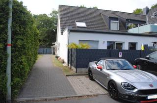 Wohnung kaufen in 47829 Krefeld, Krefeld - Erdgeschoss-Gartenwohnung im Bungalow-Stil mit privatem Eingang