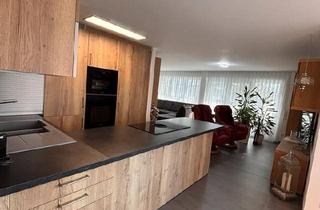 Wohnung kaufen in 74670 Forchtenberg, Forchtenberg - Moderne Gartengeschosswohnung mit Wintergarten und Garten