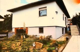 Haus kaufen in 34582 Borken, Borken (Hessen) - Lichtdurchfluteter Bungalow mit Potenzial in zentraler Lage