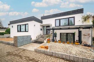 Haus kaufen in 76744 Wörth, Wörth am Rhein - Architekten-Bungalow mit Atriumgarten, Wellnessbereich & hochwertiger Massivbauweise