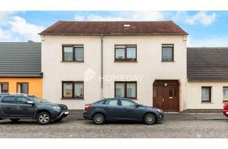 Einfamilienhaus kaufen in 06869 Coswig, Familienfreundliches Einfamilienhaus mit 6 Zimmern, schönem Innenhof und Garten