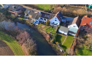 Einfamilienhaus kaufen in 41516 Grevenbroich, WOHNBAU: Wohnen am Wasser: Einfamilienhaus mit privatem Erft-Zugang - unvergessliche Kanu-Abenteuer