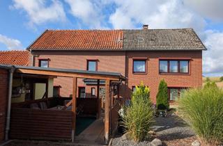 Einfamilienhaus kaufen in 38271 Baddeckenstedt, sehr schönes Einfamilienhaus mit zwei Wohnungen Doppelgarage und Blick zum Wald zu verkaufen !