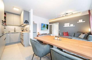 Wohnung kaufen in 85540 Haar, Moderne Wohnqualität auf zwei Ebenen mit großzügigem Garten