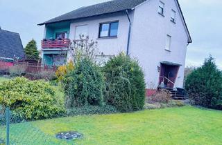 Haus kaufen in 32457 Porta Westfalica, Zweifamilienhaus mit Entwicklungspotenzial in idyllischer Lage von Porta Westfalica-Eisbergen