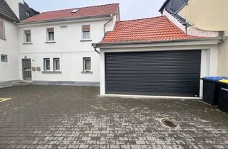 Haus kaufen in 61206 Wöllstadt, Zweifamilienhaus in Ober-Wöllstadt – Wohnen mit Charakter