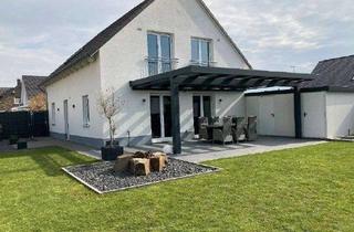 Einfamilienhaus kaufen in 41569 Rommerskirchen, freistehendes Einfamilienhaus in zentraler Lage