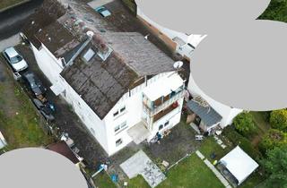 Mehrfamilienhaus kaufen in 35457 Lollar, Lollar - Attraktive Kapitalanlage: 4 Wohneinheiten mit Potenzial