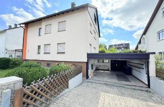 Haus kaufen in 71144 Steinenbronn, Steinenbronn - 2-Familienhaus mit ausbaufähigem DG, drei Garagen und großzügigem Grundstück