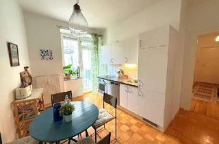 Wohnung kaufen in 80805 Schwabing-Freimann, Beliebtes Schwabing: gemütliche 2-Zi.-Altbau-Whg. mit großer Wohnküche, 2 Balkonen und TG