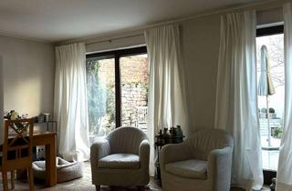 Doppelhaushälfte kaufen in 60437 Nieder-Erlenbach, Charmante Doppelhaushälfte mit offenem Grundriss, Kamin & eingewachsenem Garten