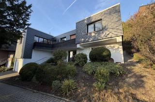 Einfamilienhaus kaufen in 45470 Holthausen, Großzügiges Einfamilienhaus mit gemütlicher Einliegerwohnung u. Doppelgarage in attraktiver Hanglage