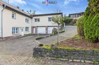 Haus kaufen in 54636 Baustert, Wohnen mit Perspektive: Haus mit zwei Wohnungen und Baugrundstück in Baustert