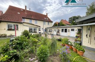 Mehrfamilienhaus kaufen in 06493 Ballenstedt, Viel Platz, viele Möglichkeiten: Mehrfamilienhaus mit 3 Wohnungen, Garten & Garagen