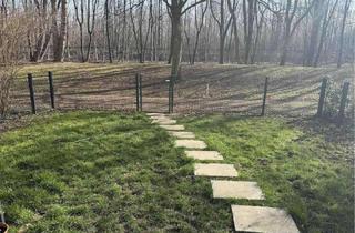 Wohnung kaufen in 80993 Moosach, Stilvolle, sanierte 2-Zimmer-Gartenwohnung mit Terrasse in Moosach