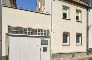 Haus kaufen in 56598 Rheinbrohl, Zentrale ruhige Wohnlage: Wohnhaus mit zwei Wohneinheiten – ideal für Familien oder Kapitalanleger