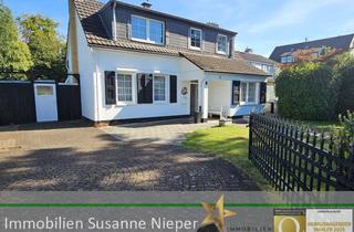 Einfamilienhaus kaufen in 42699 Ohligs-Aufderhöhe, Charmantes, freistehendes Einfamilienhaus mit Wintergarten und Atelier in Solingen Aufderhöhe